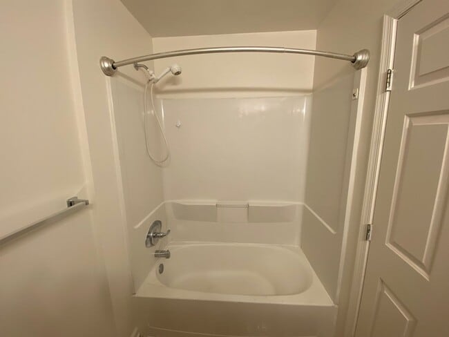 Building Photo - Application Fee Waived For Fall! A spacious three bedroom, two and one half bath townhouse locate...