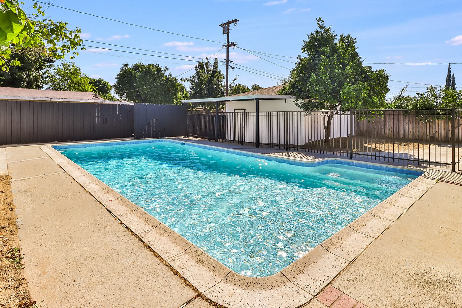 gated pool for safety - 8520 Jumilla Ave