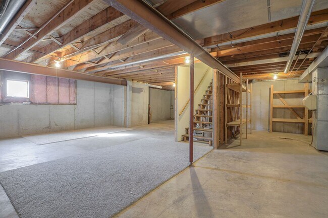 Building Photo - {11409} Updated Duplex in Fantastic Location + Two Car Garage + Main Level Master + Covered Deck