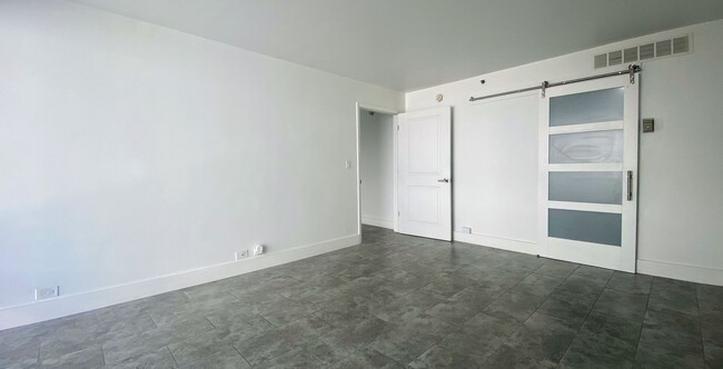 Building Photo - Live in Luxury and Convenience in the Hear...