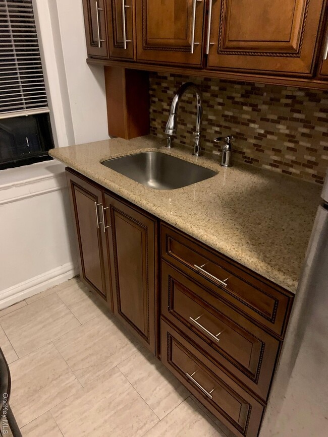 Building Photo - 77-20 Austin St