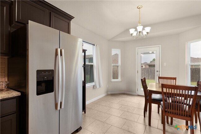 Building Photo - 8064 Bassano Dr