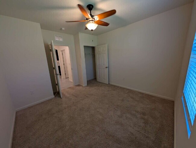 Building Photo - Modern 4-Bedroom Home with Large Backyard in Quiet SW Palm Bay – Available Mid-June
