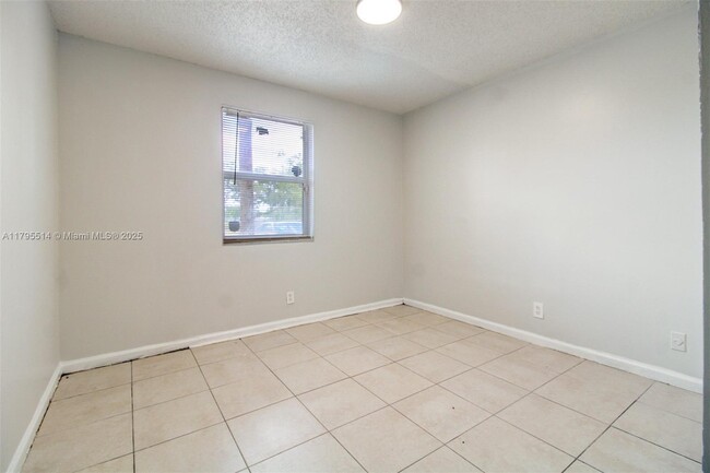 Building Photo - 2451 NW 56th Ave