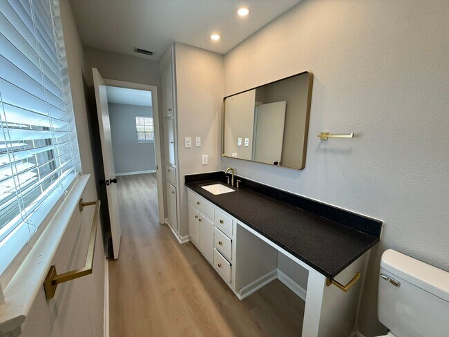 Building Photo - Available-Remodeled 3/2 with 4-Car Garage!