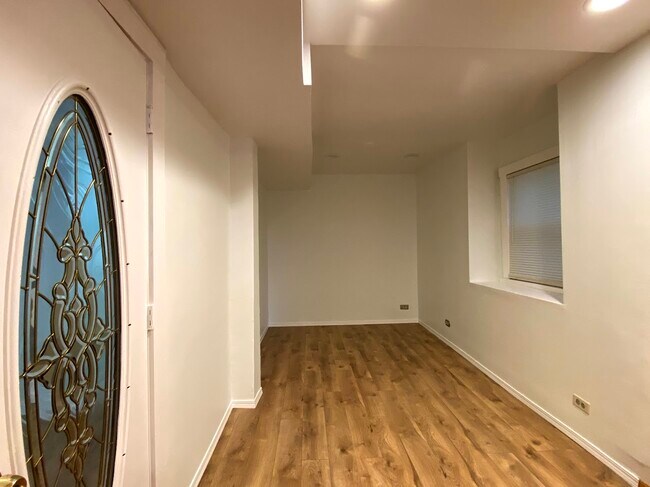 Primary bedroom fits king bed with walk-in closet and office nook - 1928 N Monticello Ave