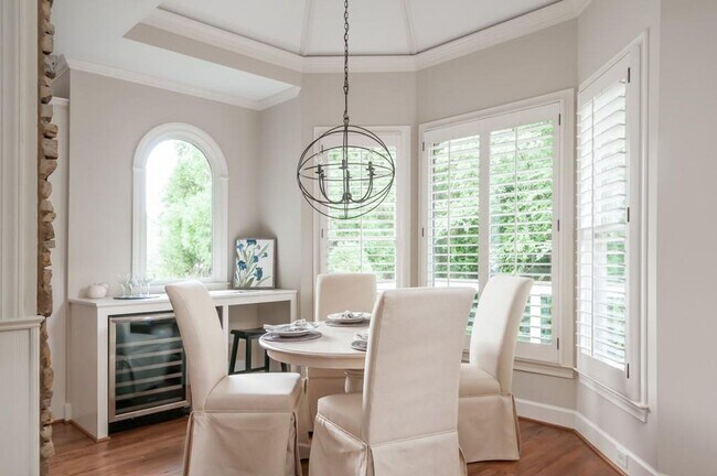 Building Photo - Elegant Master-on-Main in Prestigious Laur...