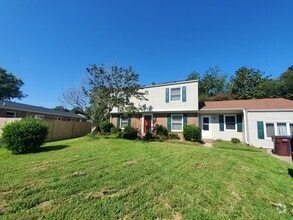 Building Photo - 4 bedroom and 2 and a half single family h...