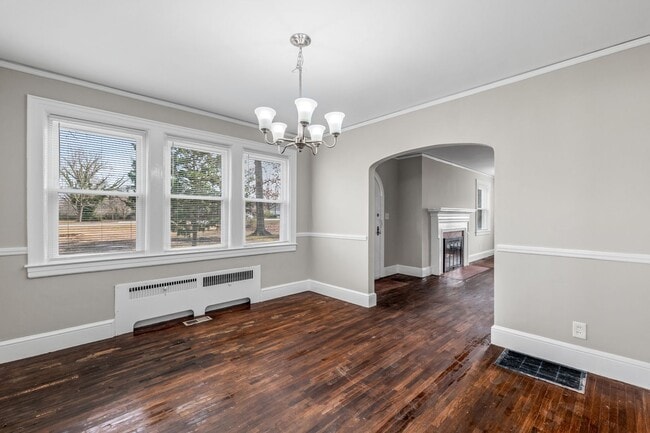 Building Photo - SW, Large Brick Two Bedroom PLUS Two Sun-Rooms, Hardwoods, LR & Separate DR, Fire Place!