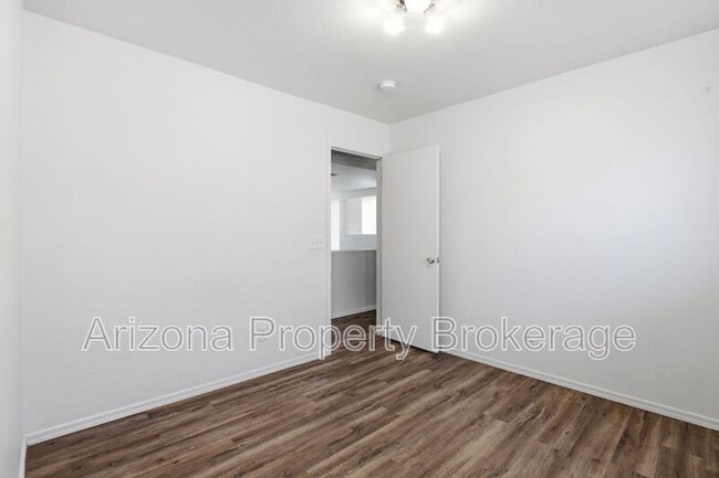 Building Photo - 15535 W Port Au Prince Ln