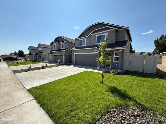 Building Photo - NEW Modern Townhouse with Two Car Garage i...