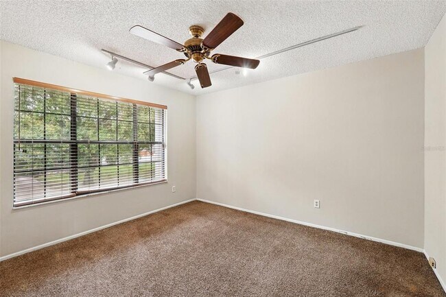Building Photo - 7925 Tumblestone Dr