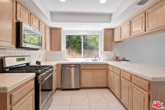 Building Photo - 8473 Penfield Ave