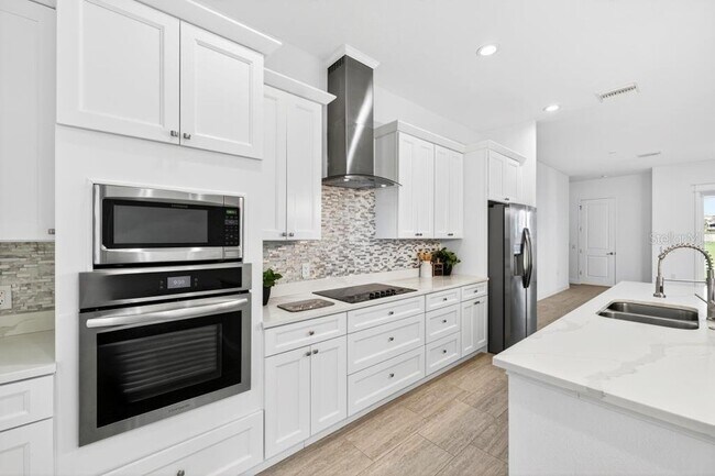 Building Photo - 200 Snowy Orchid Way