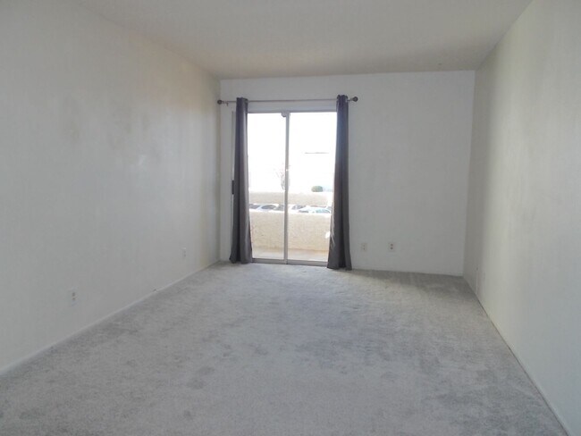 Building Photo - Two-story, 2-bedroom townhome ideally located in the heart of Boulder City