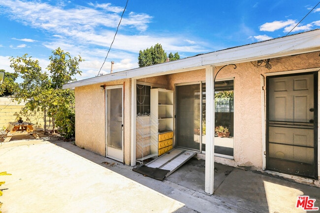 Building Photo - 16711 Mapes Ave