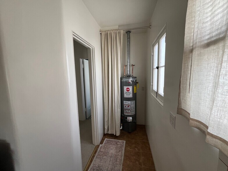 Hot water heater & curtain - 1617 California Ave