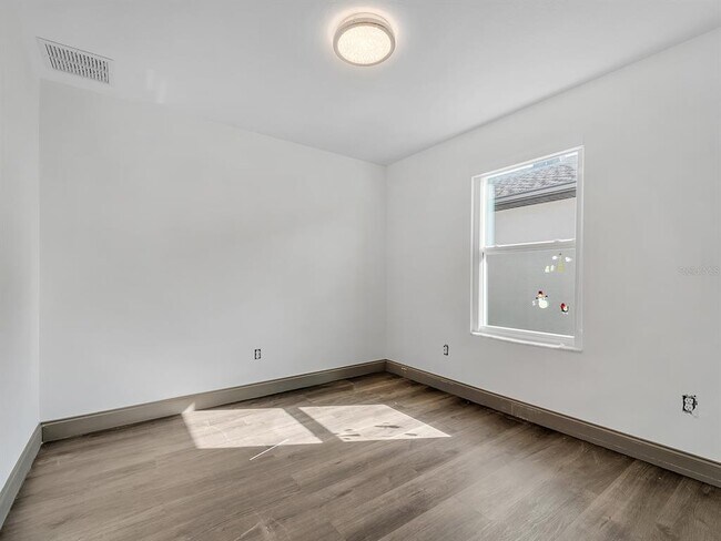 Building Photo - 7323 Pool Compass Loop