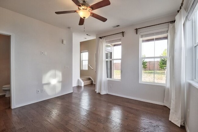 Building Photo - Immaculate 3-Bedroom Townhome with Stainless Steel Appliances and Attached Garage Near Peterson SFB