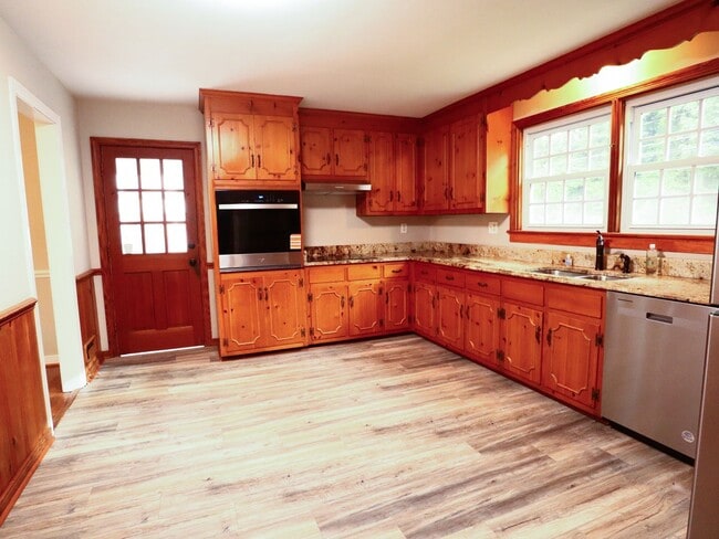 Building Photo - Incredible 2 story in West End with huge wraparound lawn