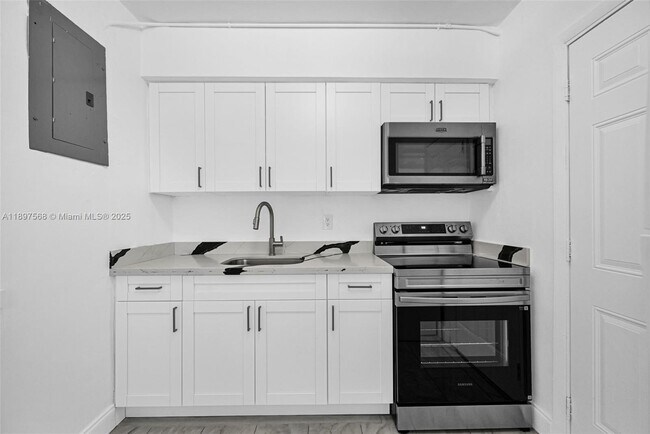 Building Photo - 6432 NE 1st Ct