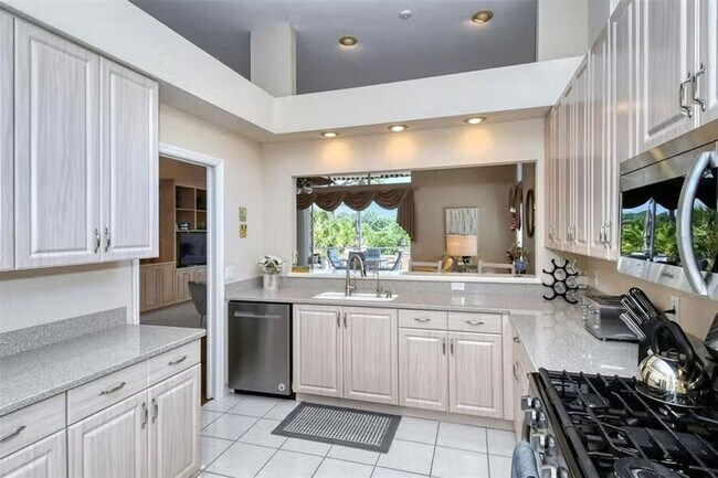 Building Photo - AVAILABLE JULY 1ST! Water & Golf Views in University Park Country Club with Pool and Spa!  3bed |...