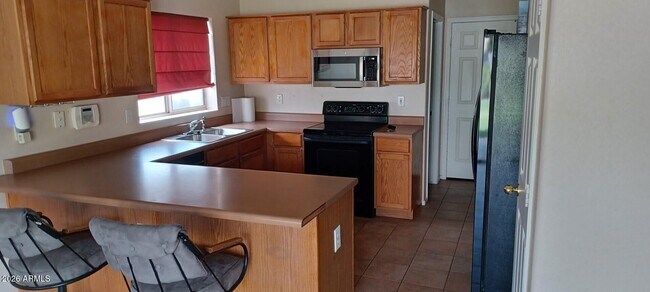 Building Photo - 3930 W Hackamore Dr