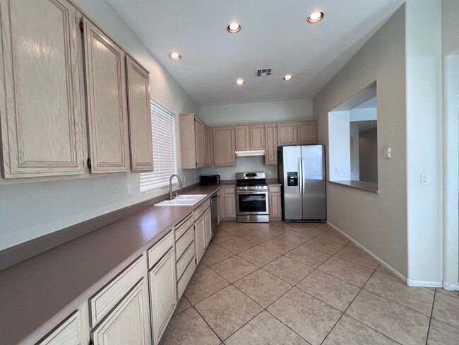 Building Photo - SUMMERLIN SINGLE STORY FOUR BEDROOM THREE ...