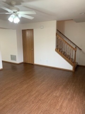 Living room view - storage under the stairs - 405 Franklin St