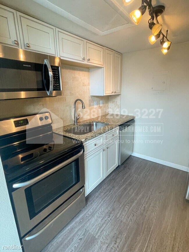 Building Photo - 1 br, 1 bath Condo - 3337 S Monaco Pkwy Un...