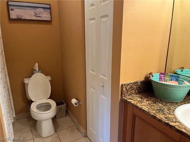 Building Photo - 10110 Villagio Palms Way