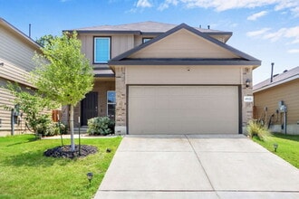 Building Photo - "Charming 4-Bedroom Retreat with Spacious ...