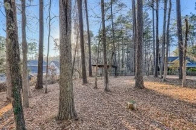 Building Photo - **Application Pending** Turnkey, Partially Furnished 3BR Durham Retreat | Walkable, Renovated, & ...