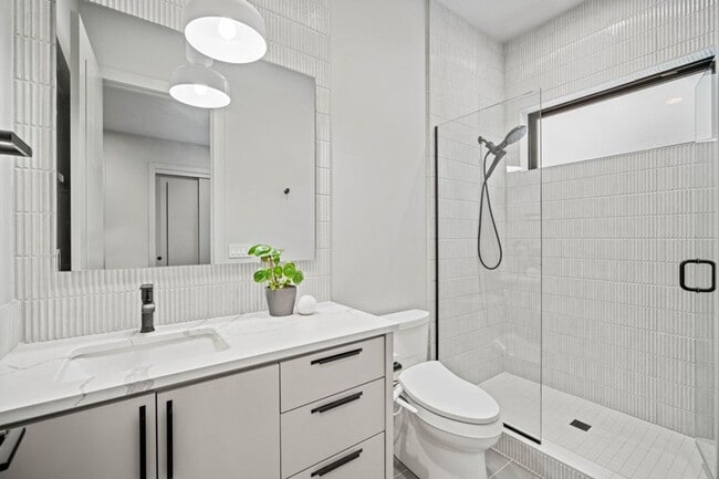 Building Photo - Modern living near Old Mill! Beautiful unf...