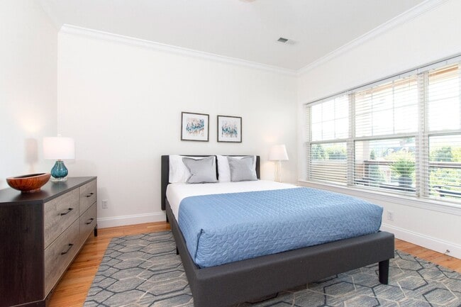 Building Photo - Luxurious Furnished Downtown Condo - 6-18 ...