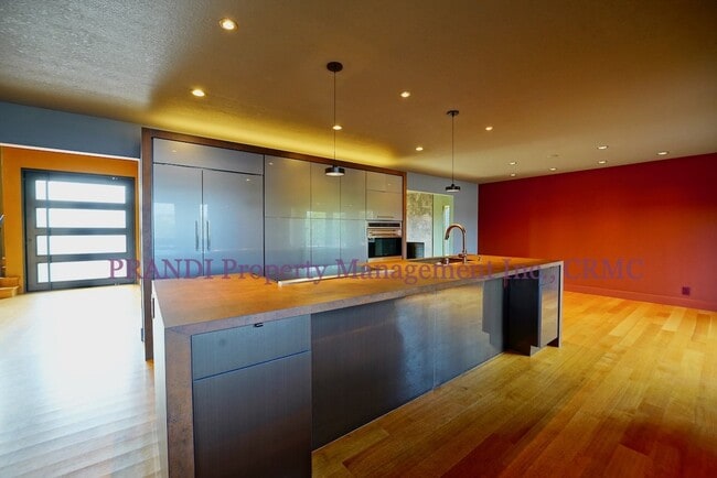 Building Photo - Sleek, Expansive, Designer Home with Priva...