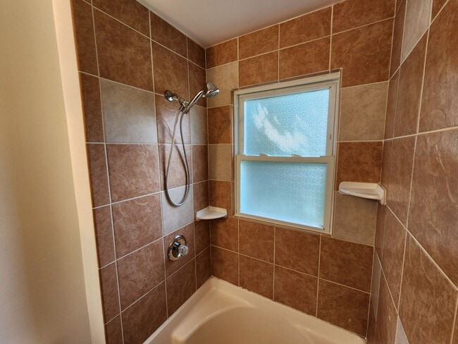 Building Photo - 4 BR home with first-floor living, new roof, and a private-feeling backyard in Lincoln Place