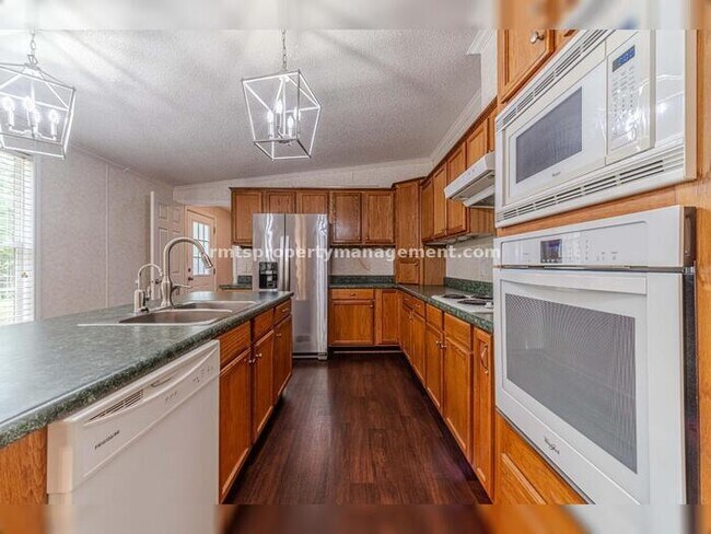 Building Photo - A COUNTRY DREAM! 4BR, 2BATH MANUFACTURED HOME, $1650./month