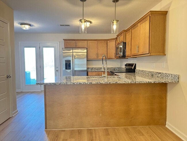 Building Photo - New Construction in the Heart of St. B! 2BR/2.5BA Minutes from the Best Shopping, Dining, and I-2...