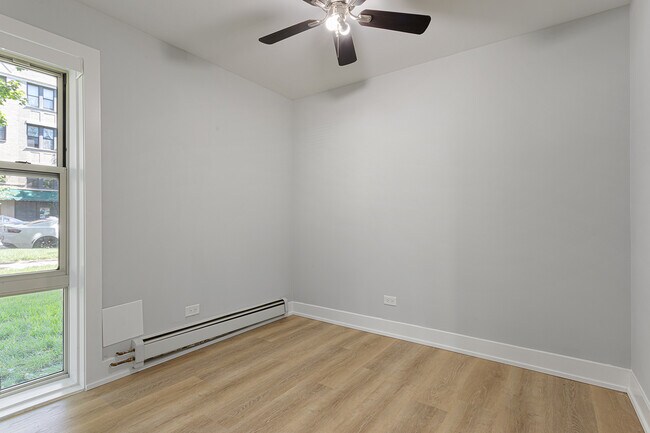 Building Photo - 1303 W Estes Ave