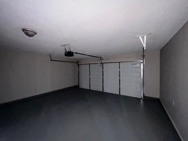 Building Photo - Spacious 4BR/2BA Olive Branch Home | 1,965 Sq Ft, Modern Fireplace, Bay Window & 2-Car Garage