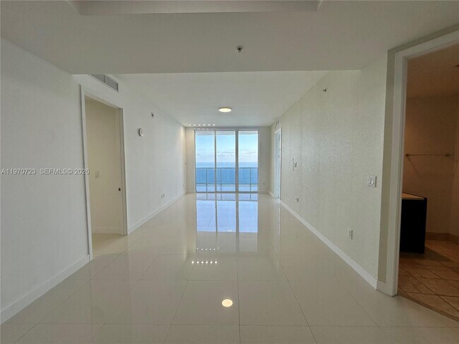 Building Photo - 18201 Collins Ave