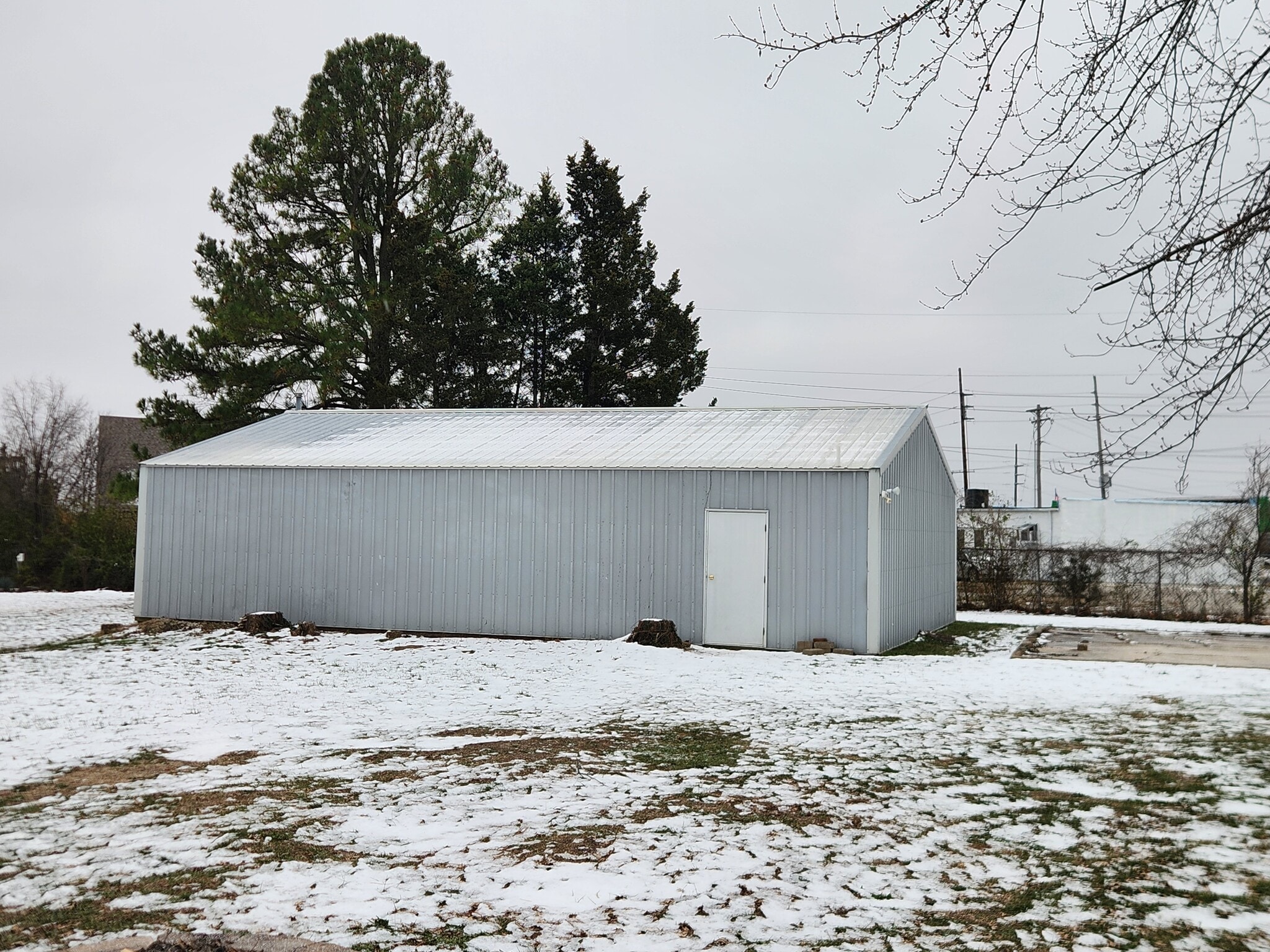 Pole barn garage space for parking and personal storage only. - 13131 East Ln