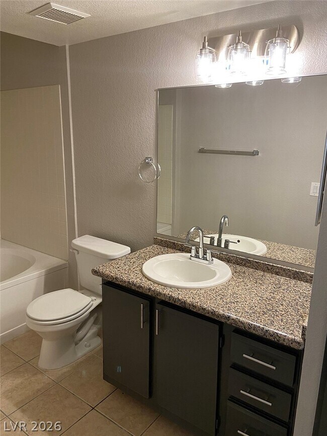 Building Photo - 5055 W Hacienda Ave