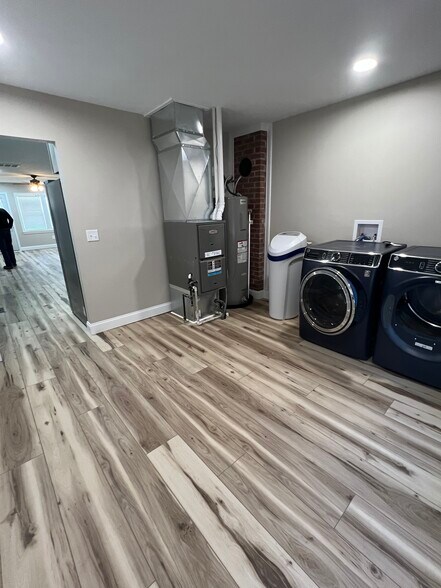 Laundry Room/mechanical room, water softener, LG front Load washer and dryer - 408 John St