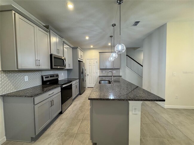 Building Photo - 8936 Matriarca Aly