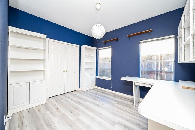 Building Photo - Discover this stunning one-story corner lo...