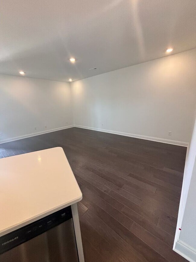 Building Photo - **BE THE LUCKY ONE TO LIVE IN THIS 2024-BUILT END-UNIT TOWNHOME IN A RESORT-STYLE COMMUNITY**