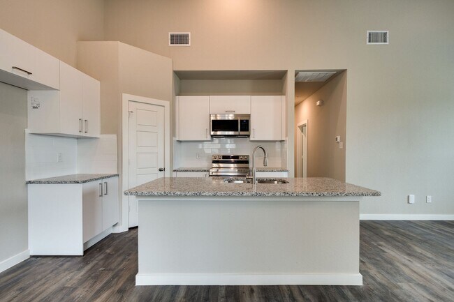 Building Photo - GORGEOUS 3 BEDROOM FOUR PLEX LOCATED IN MI...