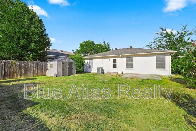 Building Photo - 7124 Wagonwheel Rd